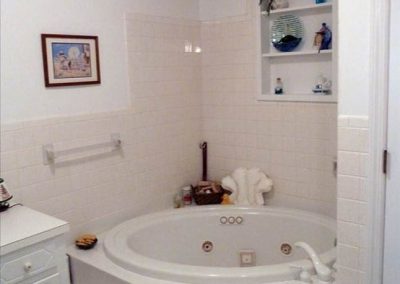 Jacuzzi tub bathroom with separate vanity